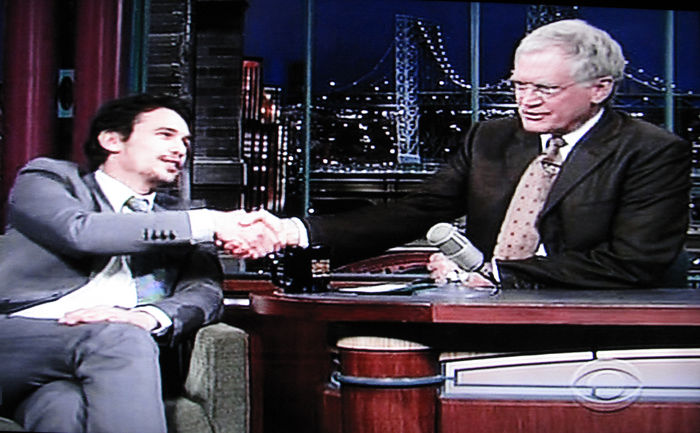 James Franco kissing David Letterman on the TV Show. James Franco and David Letterman, Nov 21, 2008 : James Franco kissing David Letterman. While James Franco was promoting his latest movie  Milk , in which he portray a gay men and kisses Sean Penn, he told David he would also kiss him so David gave him his cheek. James Franco on David Letterman Talk TV Show. Ed Sullivan Theater. New York, NY, USA. Friday, November 21, 2008.  Photo by Celebrity Vibe AFLO   2361 
