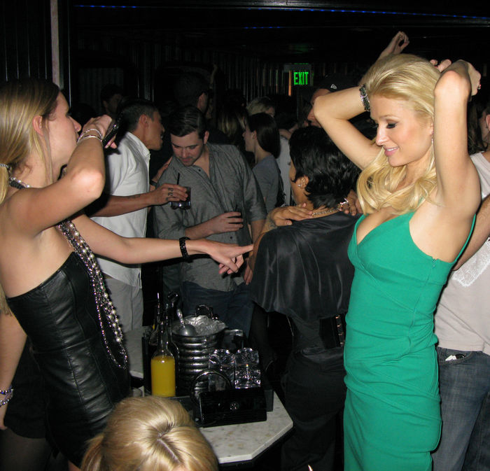 Paris Hilton fighting with boyfriend Benji Madden at Nylon Party. Nicky Hilton and Paris Hilton, Nov 11, 2008 : Paris and Nicky Hilton. Paris Hilton was fighting all night with boyfriend Benji Madden, she ignored him by turning her back on him while she was sitting on the table and talking and dancing with her girlfriends. Also at the party was her brother,  Barron Nicholas Hilton, and sister Nicky Hilton who came to support her. Nicky Hilton also had a fight with her boyfriend, David Katzenberg, because he wanted to leave and she didn  39 t, so he left around 12 a.m. That gave Nicky the opportunity to dance away with her sister Paris and brother Barron Hilton. DJ AM, was the DJ for the night. Paris Hilton Party for Nylon Magazine. Foxtail Nightclub. West Hollywood, CA, USA. Tuesday,  November 11, 2008.  Photo by Celebrity Vibe AFLO   2361 