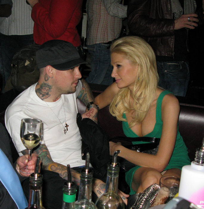 Paris Hilton fighting with boyfriend Benji Madden at Nylon Party. Benji Madden and Paris Hilton, Nov 11, 2008 : Benji Madden getting his jacket and telling Paris Hilton that he is leaving, so she is trying to convince him to stay.Paris Hilton was fighting all night with boyfriend Benji Madden, she ignored him by turning her back on him while she was sitting on the table and talking and dancing with her girlfriends. Also at the party was her brother,  Barron Nicholas Hilton, and sister Nicky Hilton who came to support her. Nicky Hilton also had a fight with her boyfriend, David Katzenberg, because he wanted to leave and she didn  39 t, so he left around 12 a.m. That gave Nicky the opportunity to dance away with her sister Paris and brother Barron Hilton.DJ AM, was the DJ for the night. Paris Hilton Party for Nylon Magazine. Foxtail Nightclub. West Hollywood, CA, USA. Tuesday,  November 11, 2008.  Photo by Celebrity Vibe AFLO   2361 