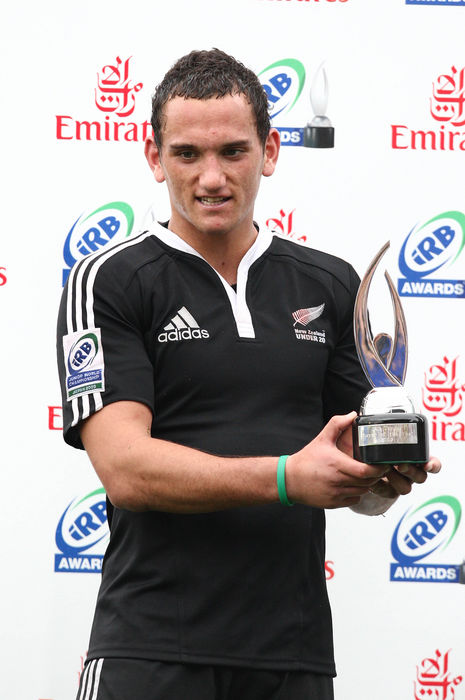 Cruden, Junior Player of the Year  . Tokyo, Japan, June 21, 2009   Aaron Cruden of New Zealand captain holds the award as he is named IRB Junior Player of the Year 2009 at the Prince Chichibu Memorial Stadium in Tokyo on Sunday, June 21, 2009. Cruden scored two tries, helping New Zealand retained the championship for the second consecutive year with a 44 28 triumph over England in the final of the IRB Toshiba Junior World Championships 2009.  Photo by YUTAKA AFLO SPORT   1040 