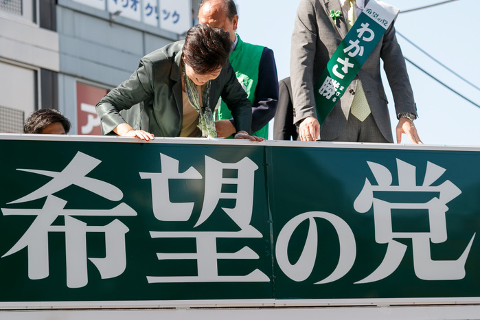 Tokyo Gov Yuriko Koike campaigns for Kibo no To Yuriko Koike, Tokyo Governor and leader of the new national party, Kibo no To  Party of Hope , looks at her party s signboard during a campaign event outside Ikebukuro Station on October 10, 2017, Tokyo, Japan. Koike offered her support to candidate Masaru Wakasa. Koike herself will not run in the election and has vowed to stay on as Tokyo Governor until the Tokyo 2020 Olympic Games. She has however set up a new national party to challenge the ruling Liberal Democratic Party. Election campaigning officially stated today on October 10 and the election will be held on October 22.  Photo by Rodrigo Reyes Marin AFLO 