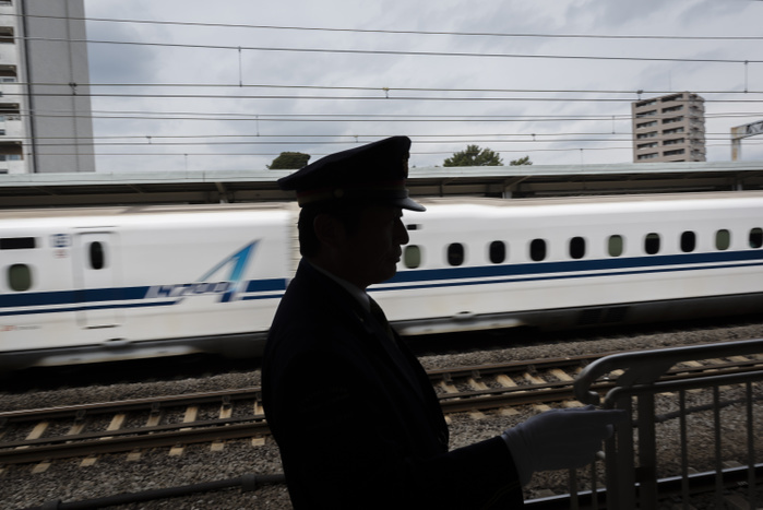 Kobe Steel Scandal Spreads OCTOBER 13, 2017   In this file photo taken March 13, 2016, a train attendant checks the platform as a bullet train passes at Odawara Station, Japan. On Thursday, October 12, two major Japanese railways, Central Japan Railway and West Japan Railway, announced that substandard parts from Kobe Steel were used in the manufacture of some of their bullet trains. Kobe Steel has admitted to falsifying data on aluminum, copper and iron ore parts, and on Friday the company announced it had  falsified data related to steel wire used in car engines and tires.   Photo by Ben Weller AFLO   JAPAN   UHU 