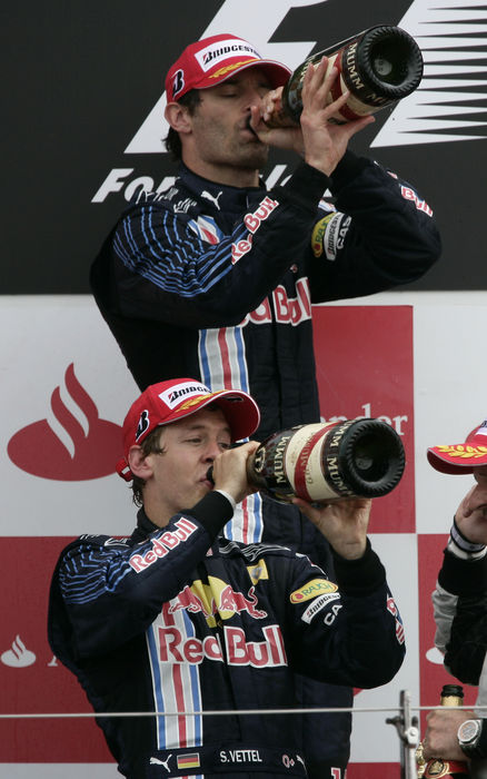 Motorsports   Formula 1: World Championship 2009, GP of England  L R  Sebastian Vettel, Mark Webber  Red Bull , JUNE 21, 2009   F1 : Sebastian Vettel of Germany and Red Bull Racing celebrates with his teammate second placed Mark Webber of Australia on the podium after winning the British Formula One Grand Prix at Silverstone in Northampton, England.  Photo by AFLO   0906      Local Caption         www.hoch zwei.net     copyright: HOCH ZWEI   Juergen Tap    