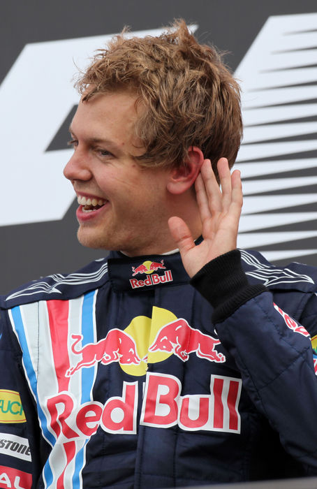 Motorsports   Formula 1: World Championship 2009, GP of England Sebastian Vettel  Red Bull , JUNE 21, 2009   F1 : Sebastian Vettel of Germany and Red Bull Racing celebrates on the podium after winning the British Formula One Grand Prix at Silverstone in Northampton, England.  Photo by AFLO   0906      Local Caption         www.hoch zwei.net     copyright: HOCH ZWEI   Juergen Tap    