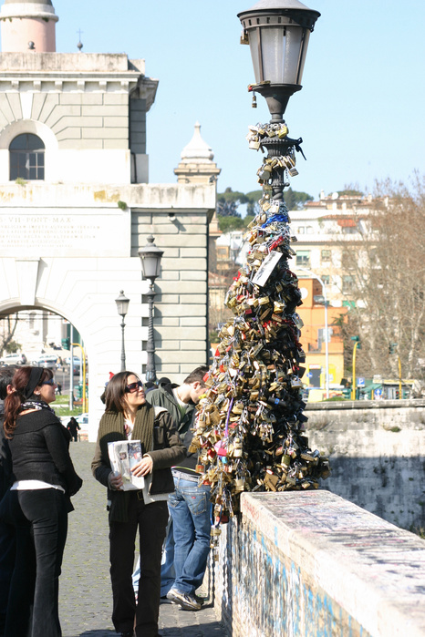 Padlock of Love Rome, Italy Padlocks Pledging Eternal Love Tied to Milvio Bridge in Rome, Popular among Young Couples, Is This a Form of  Eternal Love   Passersby look up at a pile of padlocks on Milvio Bridge in the northern part of Rome, photo by Masato Kaiho  Photo by Mainichi Newspaper AFLO   2400 .