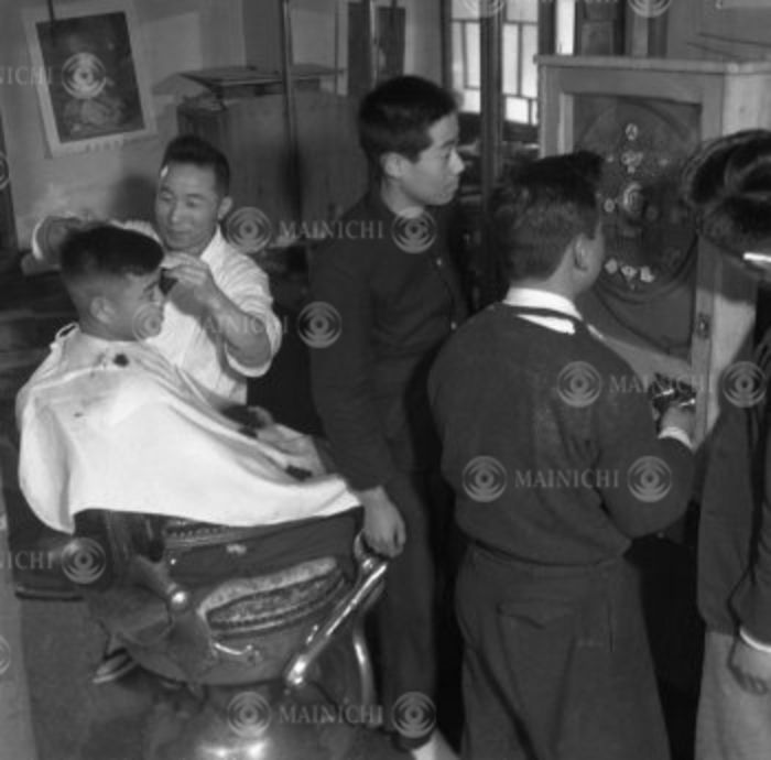 Barbershop  March 1953  Pachinko machine in a barbershop Customers are absorbed in the barbershop, Ichinoseki, Iwate, A pachinko machine installed inside a barbershop so that waiting for a haircut is no longer a chore  Photo by Mainichi Newspaper AFLO   2400   March 1953 