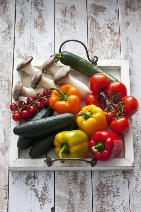 Different vegetables on wood tray