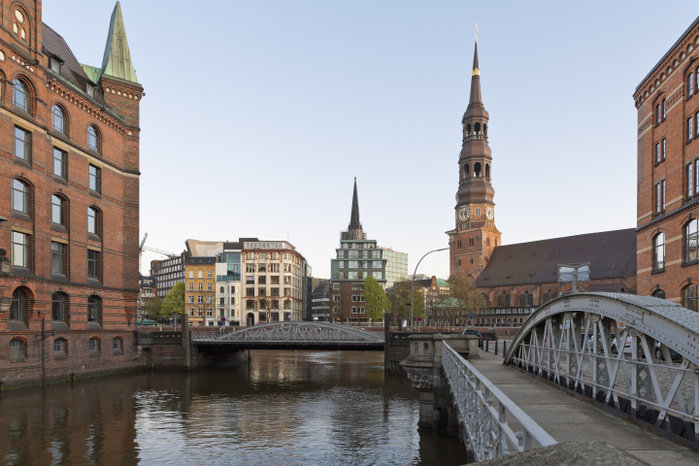 Germany, Hamburg, Bridge and church in Speicherstadt