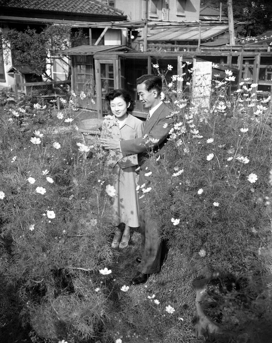 Mr. and Mrs. Ikeda Atsuko Ikeda  formerly Atsuko Junmiya , newlywed, in the garden with her husband, Takamasa, on the morning after the wedding ceremony After the first night of her marriage to Ikeda Takamasa  right , the eldest son of the former noble  marquis  family of the Bizen Okayama feudal domain, Ikeda Atsuko  formerly Junmiya Atsuko , the fourth daughter of the Ikeda family, went out into the garden of the Ikeda family s Tokyo residence  Ikeda Zoo , which had become their temporary new home, and looked at the cosmos in a friendly manner. Former name: Atsuko Junmiya  left Japan Tokyo Minato ku Shibatakanaminami cho60 for Nobumasa Ikeda  later Minato ku Takanawa 4 near Takanawa and New Takanawa Prince Hotel , October 11, 1952  Photo by Mainichi Newspaper AFLO   2400 .
