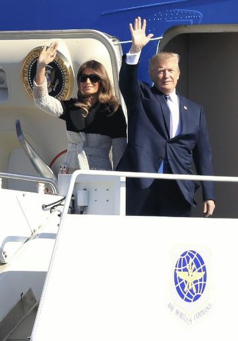 U.S. President Trump arrives in Japan for the first time at Yokota Air Base U.S. President Trump  right  and his wife Melania wave to each other upon arrival on Air Force One  10:48 a.m., May 5, at U.S. Yokota Air Base .