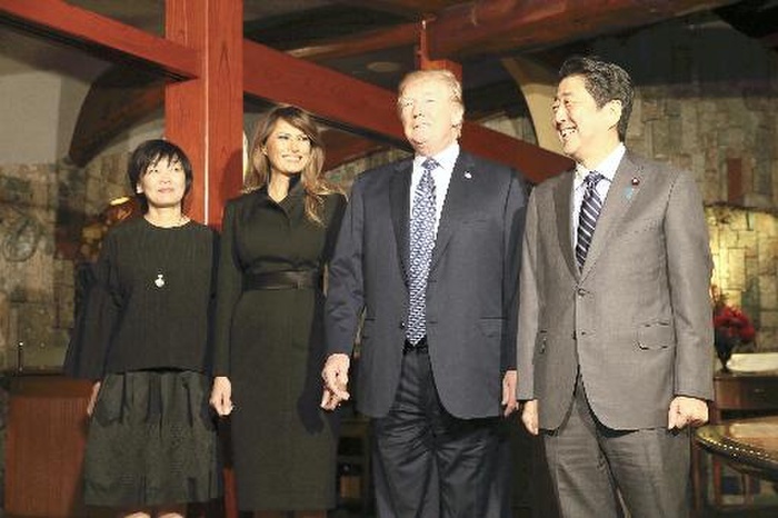 Prime Minister Abe and Mrs. Abe and U.S. President Trump and Mrs. Trump pose for a photo at a restaurant.  From right  Prime Minister Shinzo Abe, U.S. President Donald Trump, his wife Melania Trump, and his wife Akie Abe pose for a photo at a restaurant where they will share dinner. Prime Minister Abe welcomed U.S. President Trump and his wife with  hospitality diplomacy. In Ginza, Tokyo  photo taken Nov. 5, 2017  published in the November 6, 2017 morning edition of  Intimate Hospitality Trump Visits Japan, Golf, Jewelry Store, Teppanyaki .