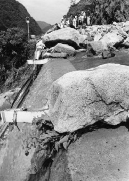 Hida River Bus Falling Down  August 19, 1968  Hida River: The site of the bus crash. Falling rocks bent the guardrail and covered Route 41,  Photo by Mainichi Newspaper AFLO   2400 .