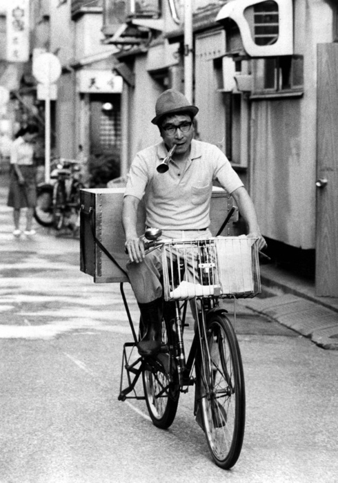 Tofu shop  July 1975  Tofu shop selling tofu, riding a bicycle around town blowing a trumpet, July 1975, Tokyo, Japan   Taken July 1975  Photo by Mainichi Newspaper AFLO   2400 .