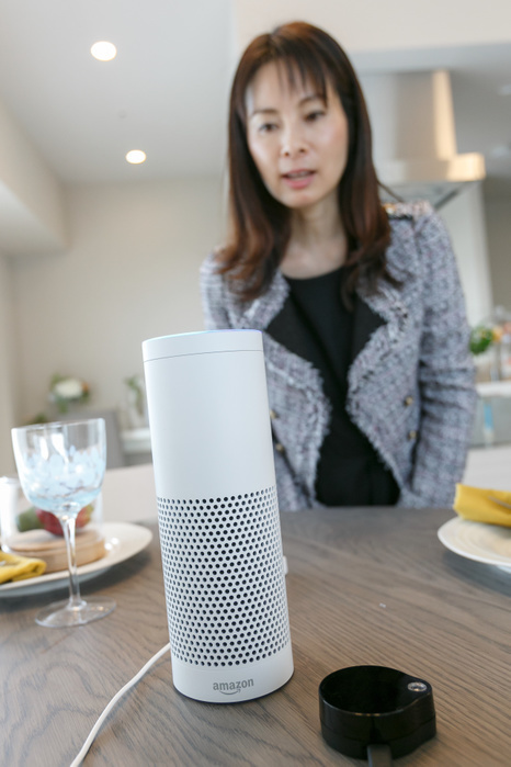 Amazon s AI Alexa to manage home appliances through voice control A woman interacts with Amazon Echo Plus at a showroom in Yokohama MID Base Tower Residence on November 22, 2017, Yokohama, Japan. Amazon Echo Plus is a smart speaker programmed with Amazon s artificial intelligence assistant app called Alexa to control home appliances such as TV and lights through human voice.  Photo by Rodrigo Reyes Marin AFLO 