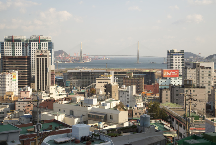 Choryang dong village and the Busan Harbor Bridge are seen in Busan Choryang village and Busan Harbor Bridge, Nov 15, 2017 : Choryang dong village and the Busan Harbor Bridge are seen in Busan, about 420 km  261 miles  southeast of Seoul, South Korea. During the 1950 53 Korean War, Busan became the home of millions of refugees who fled to the temporary capital of South Korea. The refugees gathered at hilly villages including Choryang dong near Busan Station and Busan Port to make a living.  Photo by Lee Jae Won AFLO   SOUTH KOREA 