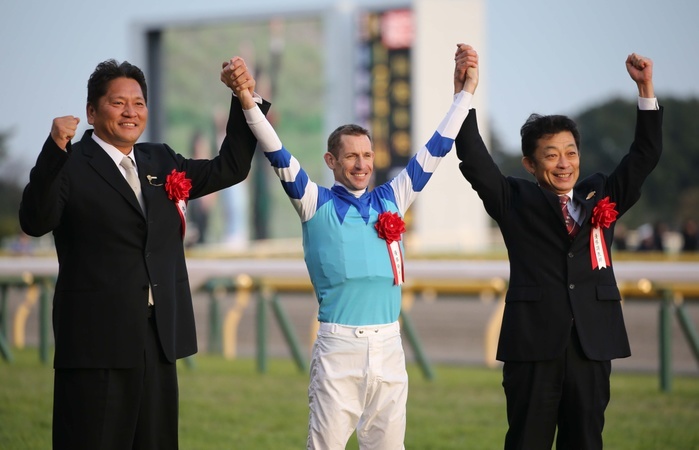 2017 Japan Cup  G1   L R  Kazuhiro Sasaki, Hugh Bowman, Yasuo Tomomichi, Trainer Yasuo Tomomichi, NOVEMBER 26, 2017   Horse Racing : Cheval Grand won the 37th Japan Cup  G1  by overtaking Kitasan Black in the stretch. Cheval Grand won the 37th Japan Cup  G1  by overtaking Kitasan Black on the straightaway. Jockey Bowman, trainer Yasuo Tomomichi  right  and owner Masahiro Sasaki  left  celebrate the victory at Tokyo Racecourse.