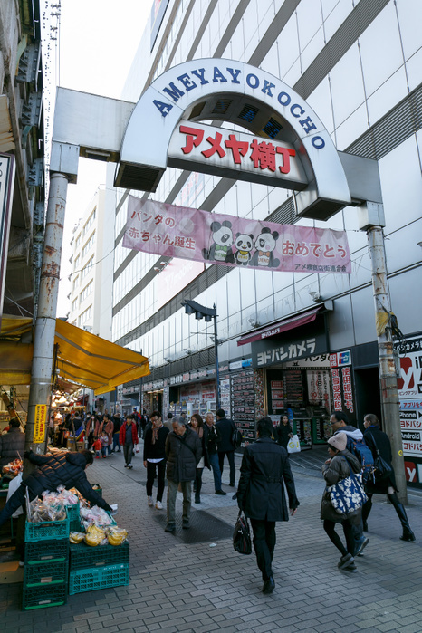 Ueno neighborhood celebrates Ueno Zoo s new panda cub A message written in Japanese saying   Congratulations for a new giant panda cub  is seen at the entrance of Ameyoko market  on December 19, 2017, Tokyo, Japan. To celebrate Ueno Zoo s new panda cub, some stores and shops in Ueno are posting congratulatory messages. Approximately 1,400 visitors came to see the cub on the day of her public debut.  Photo by Rodrigo Reyes Marin AFLO 