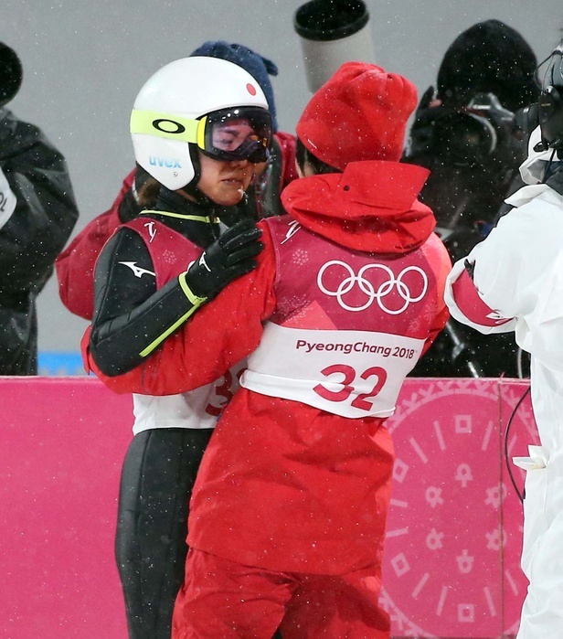 2018 PyeongChang Olympics Ski Jumping Women s Individual Normal Hill, Bronze Medal for Takanashi Pyeongchang Olympics jumping bronze medalist Sara Takanashi hugs and cries with Yuki Ito  right  after her second leap Feb. 12, 2018  photo date 20180212  photo location Alpensia Ski Jumping Center, South Korea