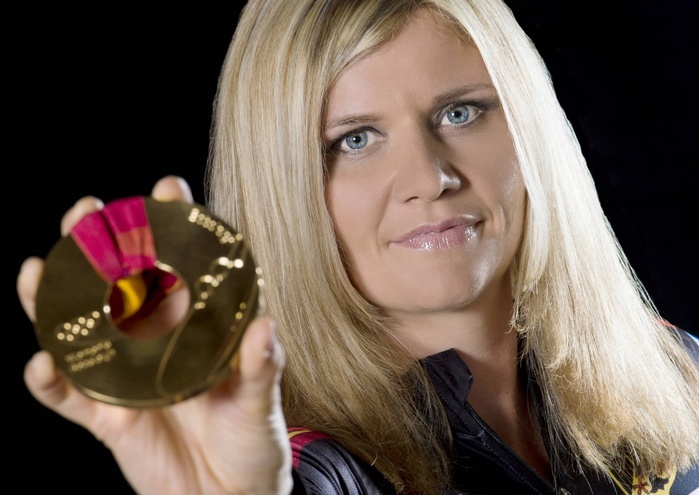 Bobpilotin Sandra Kiriasis ger with their Olympia Gold medal during the Photo shooting to new Image campaign for the women Bob team Sandra Kiriasis ger and theirs Anschieberinnen at 4 September 2012 in Berchtesgaden Studio xns x0x 2012 horizontal BSD Winter sports  
