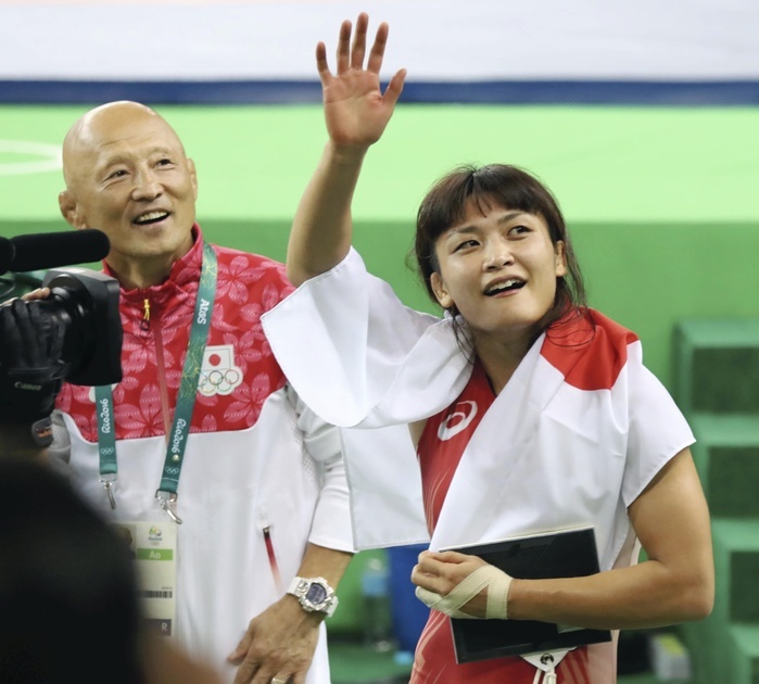 2016 Rio Olympics Wrestling Women s 58kg Final   Icho wins 4th straight title Kaoru Icho responds to cheers after winning her fourth consecutive women s wrestling title at the Rio Olympics. Rio de Janeiro Olympics. Kaoru Icho  right  responds to cheers after winning her fourth consecutive women s wrestling championship. Team leader Kazuto Sakae  left  and 58 kilogram Olympian Icho  right, ALSOK  won the gold medal in the women s individual event at the Summer Olympics, becoming the first woman in history to win four consecutive gold medals in the same event. At Carioca Arena 2 in Rio de Janeiro, Brazil  photo taken August 17, 2016.