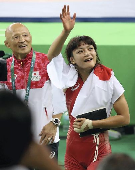 2016 Rio Olympics Wrestling Women s 58kg Final Icho wins 4th straight title Kaoru Icho responds to cheers after winning her fourth consecutive women s wrestling title at the Rio Olympics. Rio de Janeiro Olympics. Kaoru Icho  right  responds to cheers after winning her fourth consecutive women s wrestling championship. Team leader Kazuto Sakae  left  and 58 kilogram weight champion Icho  ALSOK  won the gold medal in the women s individual event at the Summer Olympics, becoming the first woman in history to win four consecutive gold medals in the same event. At Carioca Arena 2 in Rio de Janeiro, Brazil  photo taken August 17, 2016.