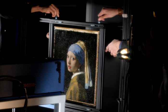 Vermeer s  Girl with a Pearl Earring    Meticulous research conducted with high tech equipment Mauritshuis museum s collection  Girl with a Pearl Earring   c. 1665  by Dutch painter Johannes Vermeer is pictured during a scientific examination at the museum March 2, 2018 in The Hague, Netherlands. An in depth scientific examination of Vermeer s iconic masterpiece is  being held, using latest technologies,  before the public from February 26 to March 11.  Photo by Yuriko Nakao Mauritshuis, The Hague AFLO   