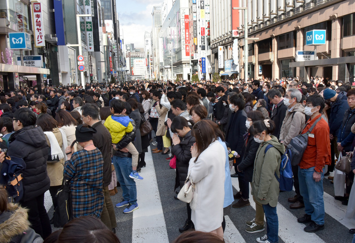 7 years after the Great East Japan Earthquake, a moment of silence at the Ginza pedestrian precinct March 11, 2018, Tokyo, Japan   Tens of thousands of people offer silent prayers for those perished in the massive earthquake and tsunami at Tokyo  s bustling Ginza shopping district on Sunday, March 11, 2018, as Japan observes the seventh anniversary of the nation s More than 73,000 people have yet to returned to their hometowns in the aftermath of the calamity that wreaked havoc on a wide  Photo by Natsuki Sakai AFLO  AYF  mis 