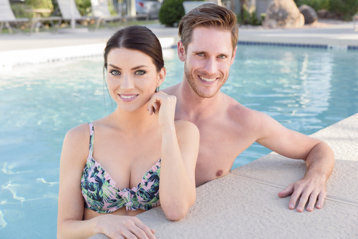  swimming  pool Portrait of Caucasian couple in swimming pool