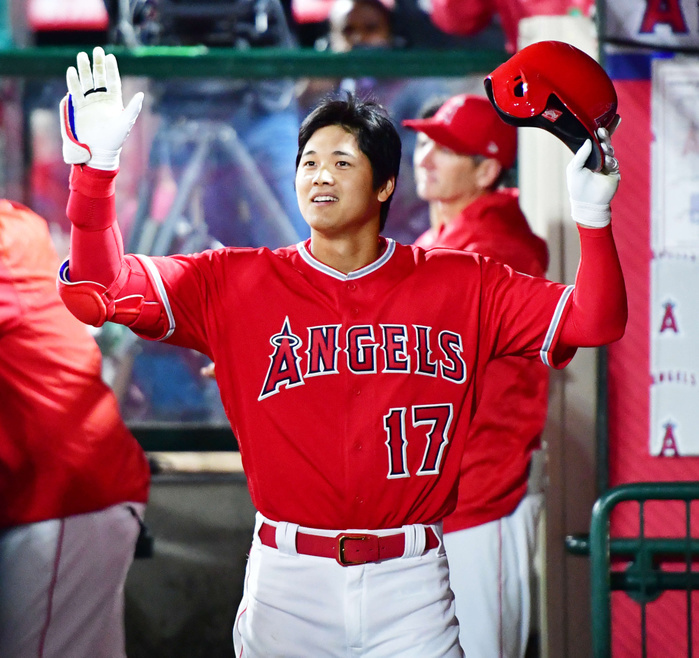 2018 MLB Otani hits first major league home run Shohei Ohtani smiles as he returns to the bench after hitting his first three run homer in the majors on April 3, 2018.