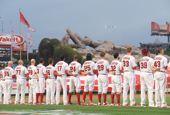 2018 MLB Angels Home Field Opener A Boeing C 17 Globemaster III flies toward Angel Stadium as Los Angeles Angels players including Shohei Ohtani  17 line up during pre game ceremonies before the Angels home opener of the Major League Baseball game against the Cleveland Indians at Angel Stadium in Anaheim, California, United States, April 2, 2018.  Photo by AFLO 
