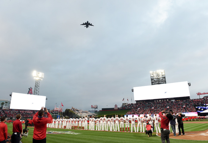 2018 MLB Angels Home Field Opener A Boeing C 17 Globemaster III flies over as Los Angeles Angels players including Shohei Ohtani  17 line up during pre game ceremonies before the Angels home opener of the Major League Baseball game against the Cleveland Indians at Angel Stadium in Anaheim, California, United States, April 2, 2018.  Photo by AFLO 