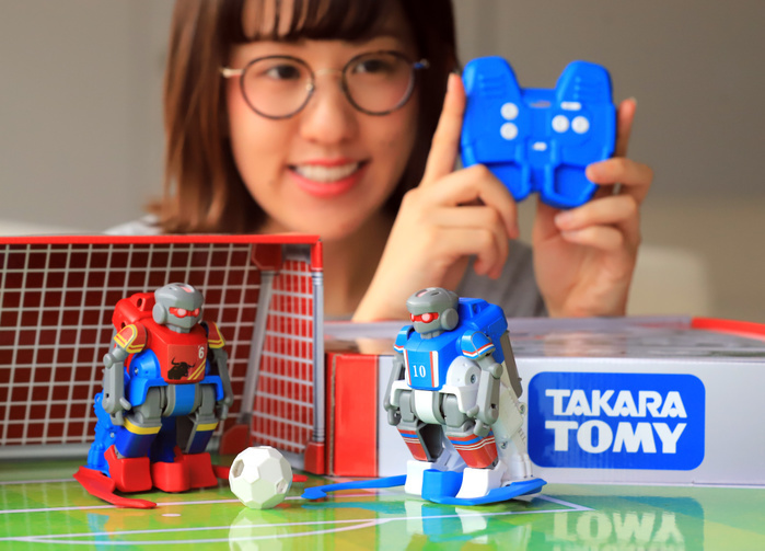 Soccer robots that can play against each other released by Takara Tomy April 12, 2018, Tokyo, Japan   Japan s toy maker Tomy displays the new remote controled toy robot for football game  SoccerBorg  at the company s headquarters in Tokyo on Thursday, April 12, 2018. SoccerBorg will go on sale on April 26 in Japan and will start to export from next month.    Photo by Yoshio Tsunoda AFLO  LWX  ytd 