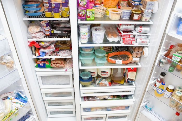 Refrigerator filled with assorted food items