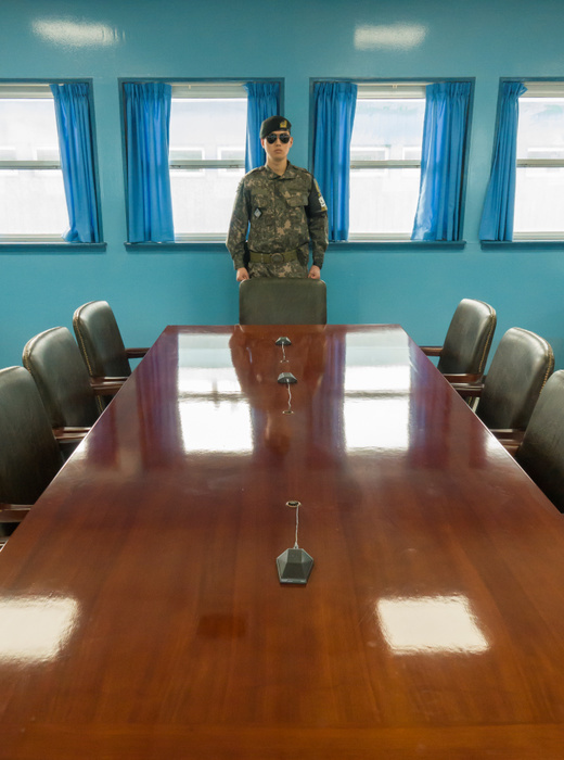 A South Korean soldier stands guard inside a United Nations Command Military Armistice Commission conference building at the truce village of Panmunjom Panmunjom, Apr 18, 2018 : A South Korean soldier stands guard inside a United Nations Command Military Armistice Commission  UNCMAC  conference building at the truce village of Panmunjom in the demilitarized zone  DMZ  separating North Korea from the South, in Paju, north of Seoul, South Korea. North Korean leader Kim Jong Un and South Korean President Moon Jae In will hold an inter Korean summit at the Peace House, a South Korea controlled building in Panmunjom, on April 27. Picture taken on April 18, 2018.  Photo by Lee Jae Won AFLO   SOUTH KOREA 