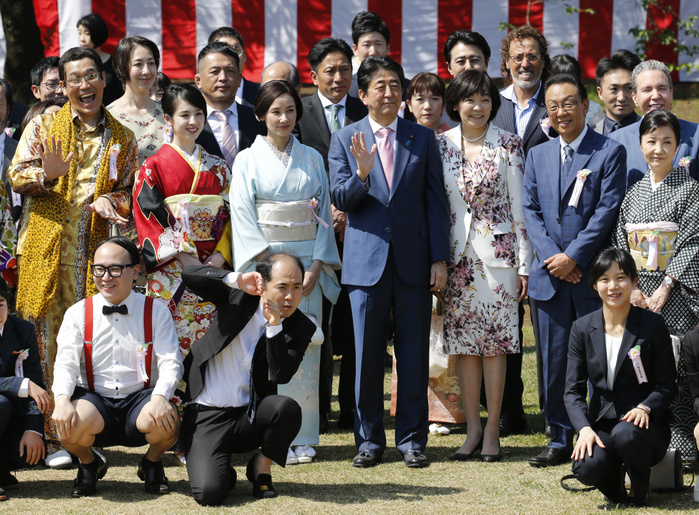 2018  Cherry Blossom Viewing Party  hosted by Prime Minister Abe Prime Minister Shinzo Abe and his wife Akie Abe pose for a commemorative photo with Yo Yo Yoshida, Tomio Umezawa, and others.  Cherry Blossom Viewing Party  held at Shinjuku Gyoen
