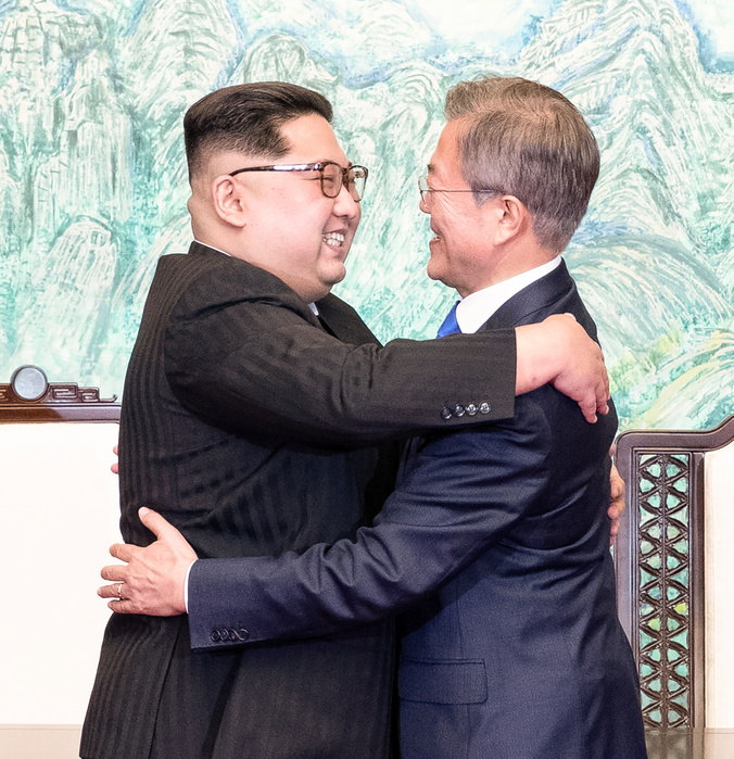South Korean President Moon and North Korean leader Kim during their inter Korean summit at the Panmunjom in Paju Moon Jae In and Kim Jong Un, Apr 27, 2018 : South Korean President Moon Jae In and North Korean leader Kim Jong Un  L  hug after they signed on  Panmunjom Declaration , a joint declaration agreed during their historic summit at the Panmunjom in the Demilitarized Zone  DMZ  separating the two Koreas in Paju, north of Seoul, South Korea. The historic summit ended with calls for the complete denuclearization of the Korean Peninsula and an immediate halt to all hostile acts, local media reported. EDITORIAL USE ONLY  Photo by Inter Korean Summit Press Corps Pool via Lee Jae Won AFLO   SOUTH KOREA 