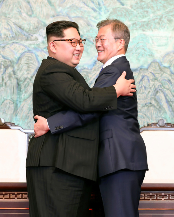 South Korean President Moon and North Korean leader Kim during their inter Korean summit at the Panmunjom in Paju Moon Jae In and Kim Jong Un, Apr 27, 2018 : South Korean President Moon Jae In and North Korean leader Kim Jong Un  L  hug after they signed on  Panmunjom Declaration , a joint declaration agreed during their historic summit at the Panmunjom in the Demilitarized Zone  DMZ  separating the two Koreas in Paju, north of Seoul, South Korea. The historic summit ended with calls for the complete denuclearization of the Korean Peninsula and an immediate halt to all hostile acts, local media reported. EDITORIAL USE ONLY  Photo by Inter Korean Summit Press Corps Pool via Lee Jae Won AFLO   SOUTH KOREA 