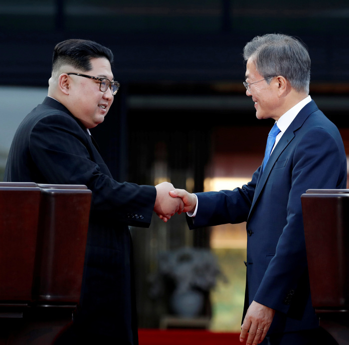 South Korean President Moon and North Korean leader Kim during their inter Korean summit at the Panmunjom in Paju Moon Jae In and Kim Jong Un, Apr 27, 2018 : South Korean President Moon Jae In and North Korean leader Kim Jong Un  L  pose after they announced  Panmunjom Declaration , a joint declaration agreed after their historic summit at the Panmunjom in the Demilitarized Zone  DMZ  separating the two Koreas in Paju, north of Seoul, South Korea. The historic summit ended with calls for the complete denuclearization of the Korean Peninsula and an immediate halt to all hostile acts, local media reported. EDITORIAL USE ONLY  Photo by Inter Korean Summit Press Corps Pool via Lee Jae Won AFLO   SOUTH KOREA 