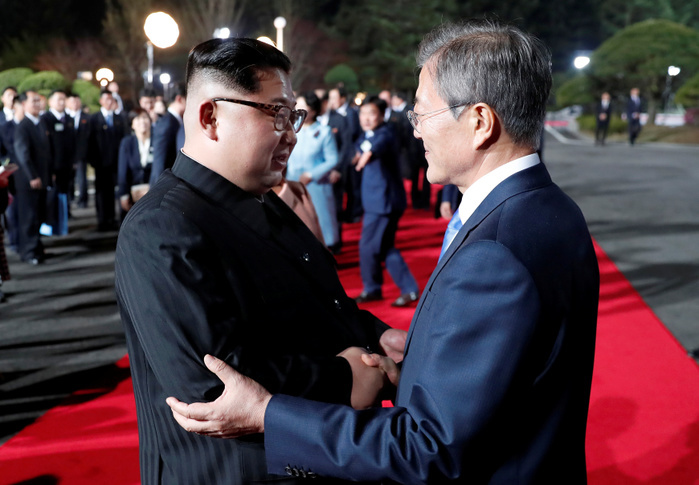North Korean leader Kim Jong Un and South Korean President Moon Jae In after the historic inter Korean summit at the Panmunjom in Paju Moon Jae In and Kim Jong Un, Apr 27, 2018 : South Korean President Moon Jae In  R  bids farewell to North Korean leader Kim Jong Un in front of the Peace House after the historic inter Korean summit at the Panmunjom in the Demilitarized Zone  DMZ  separating the two Koreas in Paju, north of Seoul, South Korea. The historic summit ended on April 27 with calls for the complete denuclearization of the Korean Peninsula and an immediate halt to all hostile acts, local media reported. EDITORIAL USE ONLY  Photo by Inter Korean Summit Press Corps Pool via Lee Jae Won AFLO   SOUTH KOREA 