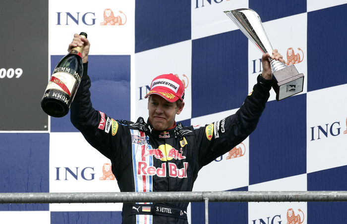 Belgian GP Vettel 3rd  Sebastian Vettel  Red Bull , AUGUST 30, 2009   F1 : Third placed Sebastian Vettel of Germany and Red Bull Racing celebrates with the trophy on the podium after the Belgian Formula One Grand Prix at the Circuit of Spa Francorchamps in Spa Francorchamps, Belgium.  Photo by AFLO   0906      Local Caption         www.hoch zwei.net     copyright: HOCH ZWEI   Juergen Tap    