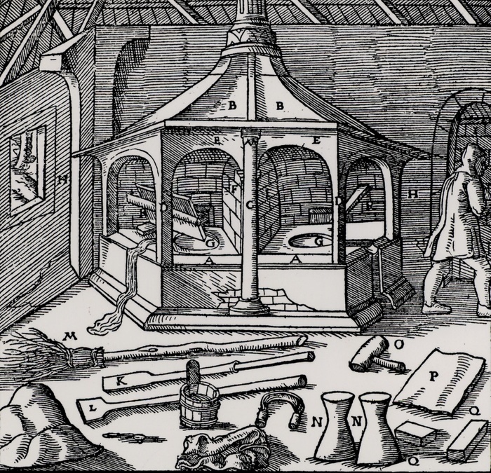 Furnace for refining copper with all the tools necessary to carry out the process.  From 'De re metallica', by Agricola, pseudonym of Georg Bauer (Basle, 1556).  Woodcut. 