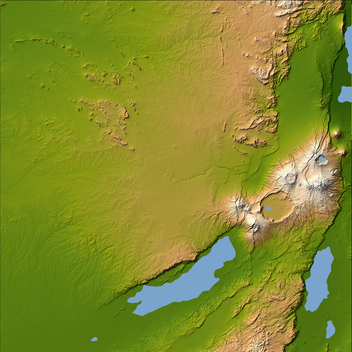 Olduvai, East Africa  NASA image, date unknown  Olduvai Gorge, East Africa Three striking and important areas of Tanzania in eastern Africa are shown in this color coded shaded relief image from the Shuttle Radar Topography Mission. The largest circular feature in the center right is the caldera, or central crater, of the extinct volcano Ngorongoro, which is surrounded by smaller volcanoes, all associated with the Great Rift Valley, a geologic fault system that extends for about 4,830 kilometers  2,995 miles  from Syria to central Mozambique.  Ngorongoro s caldera is 14 miles across at its widest point and is 2,000 feet deep and has a level floor that holds a lake fed by streams running down the caldera wall. It is part of the Ngorongoro Conservation Area and is home to over 75,000 animals. Lakes Eyasi and Manyara south of the crater are also part of the conservation area.  The relatively smooth region in the upper left of the image is the Serengeti National Park, which encompasses the main part of the Serengeti ecosystem, supporting the greatest remaining concentration of plains game in Africa including more than 3,000,000 large mammals. The faint, nearly horizontal line near the center of the image is Olduvai Gorge, made famous by the discovery of remains of the earliest humans known to exist.  Image Credit: NASA