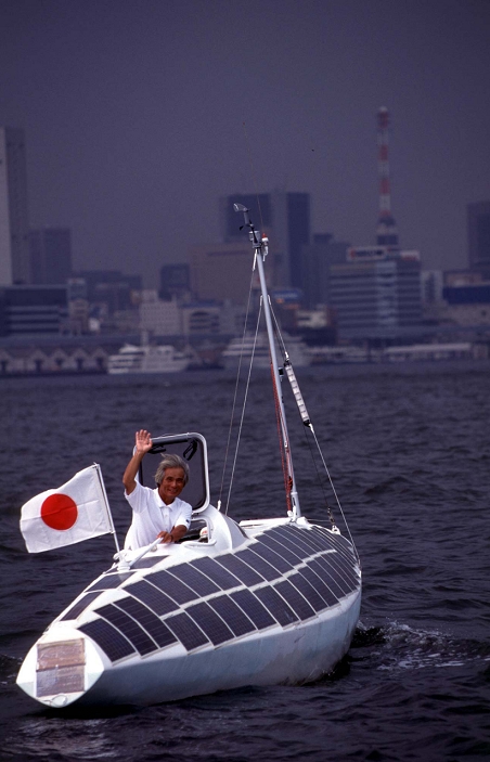 Kenichi Horie  August 5, 1996   Japan: August 5, 1996 Tokyo   Ken ichi Horie, a Japanese adventurer, waves from his solar powered yatch as he arrives in Tokyo following a cross Pacific non stop solo voyage. The 57 year old sailor left Equador on March 20 and covered 16,000 kilometers in his yacht Mermaid made of 22,000 aluminum beer cans.  Photo by Fujifotos AFLO   3618 
