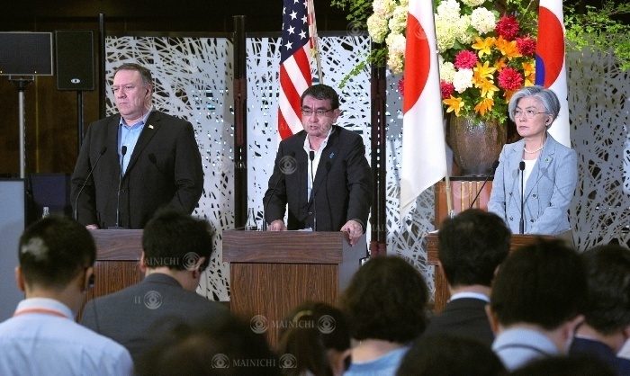 From left, U.S. Secretary of State Pompeo, Japanese Foreign Minister Taro Kono, and South Korean Foreign Minister Kang Kyung wha at a joint press conference after the Japan U.S. South Korea foreign ministers  meeting. From left, U.S. Secretary of State Pompeo, Foreign Minister Taro Kono, and South Korean Foreign Minister Kang Kyung wha hold a joint press conference after the meeting of the foreign ministers of the United States, Japan, and South Korea, July 8, 2018, at the Iikura diplomatic mission of the Foreign Ministry in Minato ku, Tokyo.