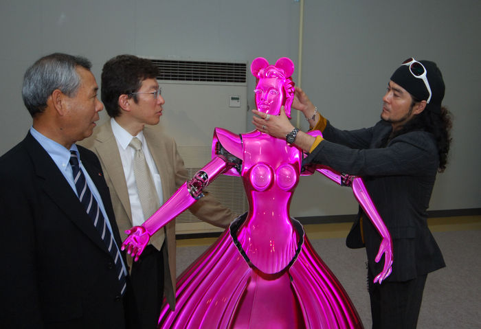 The World s Invention Extravaganza Evolving Humanoid Robots  June 4, 2005  Mobile Smart Dance Robot PBDR Dancer  Partner Ballroom Dance Robot   A robot dance partner,  PBDR Dancer, dances with the lead of a man in Chino, central Japan, June 4, 2005. PBDR Dance was manufactured by Nomura Unison Co Ltd and Tohoku University.a dance partner robot referred to as PBDR Dance, which has been developed as a platform for realizing effective human robot coordination with physical interaction. PBDR Dance consists of an omni directional mobile base to realize various dance steps in a ballroom dance and the force torque sensor referred to as Body Force Sensor to realize compliant physical interaction between the PBDR Dance and a human based on the force moment applied to the human. photo by fujifotos   Photo by Fujifotos AFLO   3618 
