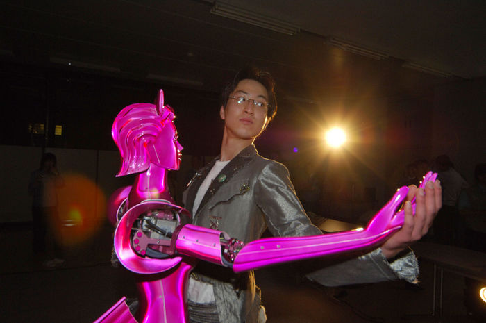 The World s Invention Extravaganza Evolving Humanoid Robots  June 4, 2005  Mobile Smart Dance Robot PBDR Dancer  Partner Ballroom Dance Robot   A robot dance partner,  PBDR Dancer, dances with the lead of a man in Chino, central Japan, June 4, 2005. PBDR Dance was manufactured by Nomura Unison Co Ltd and Tohoku University.a dance partner robot referred to as PBDR Dance, which has been developed as a platform for realizing effective human robot coordination with physical interaction. PBDR Dance consists of an omni directional mobile base to realize various dance steps in a ballroom dance and the force torque sensor referred to as Body Force Sensor to realize compliant physical interaction between the PBDR Dance and a human based on the force moment applied to the human. photo by fujifotos   Photo by Fujifotos AFLO   3618 