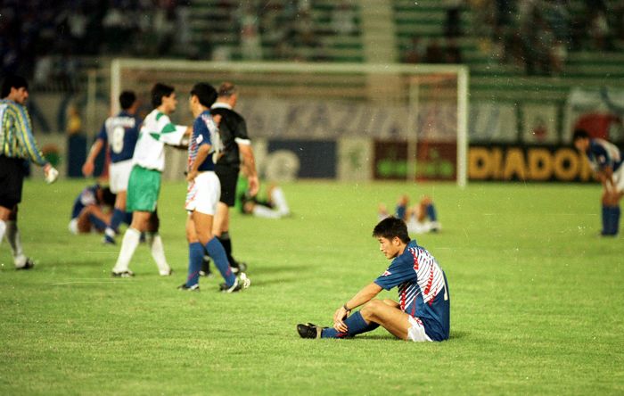 1994 FIFA World Cup Final Qualifying Round in Asia Doha Tragedy Kazuyoshi Miura  JPN , OCTOBER 28, 1993   Football   Soccer : World Cup USA  94 Asia Final Qualifier Japan vs. Iraq Kazuyoshi Miura sits on the pitch and nods in disappointment after missing his first World Cup appearance with a goal in injury time. Tomoyoshi Miura sits down on the pitch and nods in disappointment. The match has since been referred to as the  Doha Tragedy   October 28, 1993   Date 19931028  Date   Photo Location Doha, Qatar