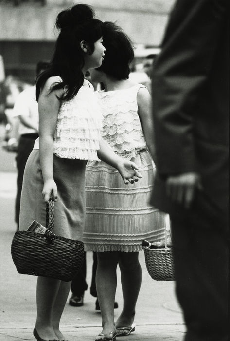 Sixties Fashion  Taken in 1962  Women wearing lace frilled camisoles and knee length skirts. Basket bag in hand, 1962  Photo by Yoshitaka Nakatani AFLO   0780 .