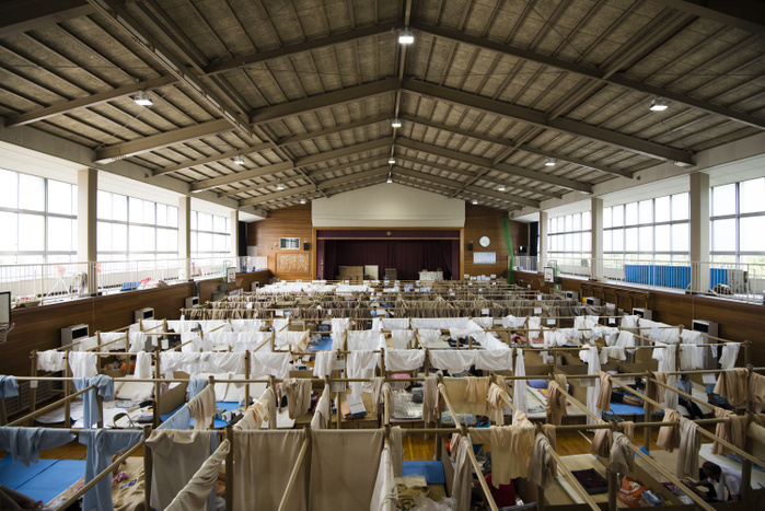 Disaster Response in Okayama Prefecture JULY 17, 2018   People whose homes were damaged or destroyed by flooding take shelter at Okada Elementary School, a temporary shelter for flood victims, in Mabicho, Kurashiki, Okayama Prefecture, Japan. More than 200 people died in floods and landslides caused by torrential rains more than a week ago. On Sunday, the government announced the weather event would be designated an extremely severe disaster, freeing up recovery funds for the affected areas.   Cleanup and recovery efforts have been hampered by extreme heat. Temperatures in Okayama Prefecture reached 37 degrees Celsius on Tuesday.  Photo by Ben Weller AFLO   JAPAN   UHU 
