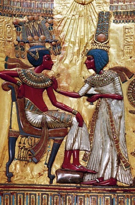 Tutankhamen and the Unescenamen Rear panel of the royal throne of Tutankhamun depicting Ankhesenamen with out stretched arms preparing to anoint the pharaoh, wood, gold leaf, silver, glass gems and precious stones, from the Pharaoh s tomb, Thebes, Egypt. Egyptian civilisation, New Kingdom, Dynasty XVIII.